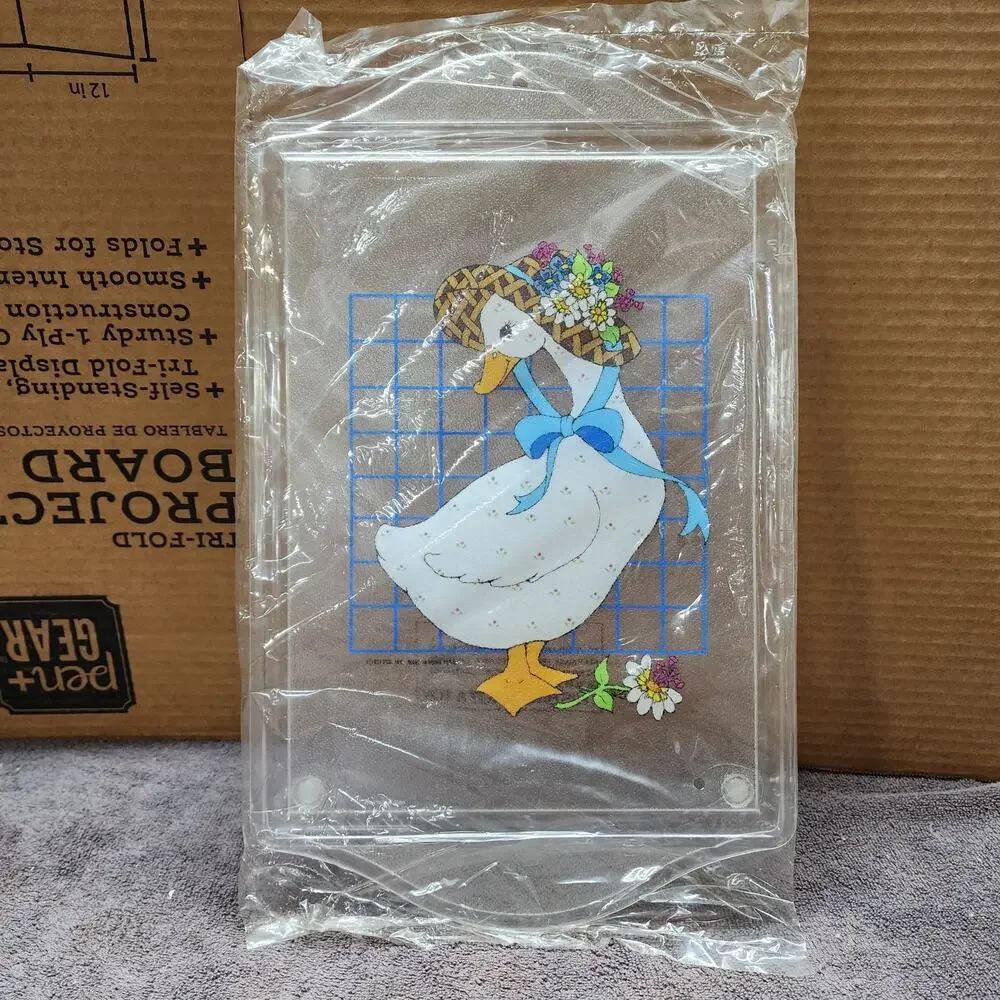 New Plastic duck in a bonnet cutting board b48